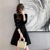 Vestido suéter de punto coreano de cuello alto, vestido de otoño e invierno que ciñe la cintura, pequeño vestido negro Hepburn, vestido base versátil