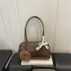 Bolso de Hombro Único Moda Simple Retro Estilo Coreano Bolso Casual de Nicho para Mujer 2026 Otoño Nueva Llegada Bolsillo de Axila con Personalidad