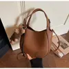 Bolsa Pequena Coreana Retro Transfronteiriça para Mulheres Nova Moda Primavera 2026 Versátil Bolsa Transversal Super Popular Bolsa de Mão Estilo Balde