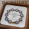 Collar de flor de esmalte azul exquisito versátil de moda retro ins europeo y americano con una cadena para la clavícula de sensación de lujo ligero y alta gama