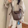 Bolsas Nicho Retro Estilo Coreano para Mujer 2026 Nuevo Bolso Calabaza Simple Versátil Bolso de Hombro Cruzado Bolso Cubo de Gama Alta