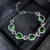 Transmisión en vivo nuevo lujo micro-incrustado Diamante Corazón del océano collar imitación Esmeralda rubí pulsera al por mayor