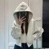Sudadera Gris con Capucha Corta Estilo Coreano para Mujer Otoño Temprano 2026 Holgada Casual Chaqueta con Cremallera Top de Manga Larga de Alta Gama