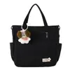 Bolsa de lona tipo tote, estilo japonés, gran capacidad, diseño nuevo, adecuada para estudiantes, versátil para el uso diario, casual y simple, bolso de hombro para la escuela, el trabajo y el uso diario