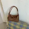 Bolso de Axila con Textura de Nicho Otoño/Invierno para Mujer 2026 Nuevo Bolso Cubo de Gamuza y Felpa Bolso Simple de Hombro/De Mano