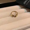 Anel de Ouro com Pedra Olho de Tigre Vintage para Mulheres 2026 Novo Estilo Quente Luxo Leve Simples Versátil Anel Ajustável