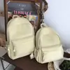 Mochila Casual Simple de Color Sólido Gran Capacidad Ligera Versátil Mochila de Viaje Hombres y Mujeres Exterior Estudiante Mochila Escolar Mujeres
