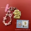Llavero de tela con logo de empresa personalizado Cadena para teléfono móvil Angela Lámina de oro puro Oro 999 Regalo de aniversario