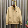 Chaqueta de doble capa para hombre con cuello alto bordado para primavera y otoño, moda masculina de alta gama, abrigo casual de moda de talla grande