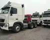 Tractor Sinotruk Howo Th7 para Mercancías Peligrosas 460 Caballos de Fuerza Guardabarros Integral Tanque de Gasolina de 1000L Rojo Cristal