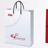 Nossa Fábrica Personaliza Sacolas de Papel de Couro Sintético. Sacolas Tote com Fundo Quadrado. Sacolas Verticais para Levar com Múltiplas Especificações para Escolher, e Você Pode Adicionar Sacolas de Papel Kraft