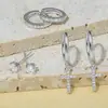 Amazon Latón Electrochapado en Oro Real Moda Transfronteriza Europea y Americana Colgante de Cruz de Circonita Pendientes para Mujer Juego de Tres Piezas
