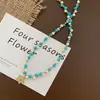 Collar Colgante de Estrella de Cinco Puntas con Cuentas para Mujer 2026 Nuevo Estilo Lujo Ligero Elegante Cadena para el Cuello Diseño de Nicho Accesorio de Alta Gama