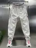Pantalones Joggers Negros Ajustados Color Bloque Celebridad de Internet Casual Largos Verano Tendencia Estilo Callejero Frescos Ropa de Hombre Pantalones Harem Versátiles de Moda Tendencia