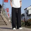 Pantalones rectos holgados, finos, arrugados, con caída, estilo chino nuevo, pantalones largos casuales de flor de durazno para hombre, verano, seda de hielo, transpirables, estilo nacional