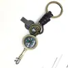 Llavero creativo punk para hombre y mujer, pequeño regalo, brújula de aleación, llavero de cuero tejido vintage, colgante para llaves