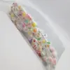 Pincel de mascara de tubo transparente de dibujos animados mezcla de colores mini de dibujos animados lindo independiente con tubo pincel de mascara de pestañas peine pequeño en stock