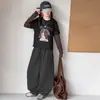 Conjunto Casual Feminino Primavera e Outono 2026 Novo Estilo Coreano Moda Duas Peças com Blusa Patchwork e Calça de Perna Curva