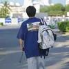 Camiseta Estampada de Desenho de Boneca Retro Americana de Manga Curta para Homens 2025 Nova Moda de Verão Tops Soltos para Casal Tendência