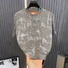 Camiseta de Marca Nueva y de Moda 2026 con Diseño de Rayas Verticales Florales Estilo Tinta Lavada, Corte Holgado, Top Casual de Manga Corta para Hombre