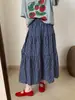 Saia midi xadrez de alta qualidade com acessório de cabelo 2026 Nova Coleção Primavera Estilo Coreano Casual Temperamento Cintura Alta Emagrecedora Saia Longa
