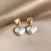 Pendientes Retro de Alta Gama con Aguja de Plata 925 en Forma de Corazón para Mujer 2025 Nuevos Populares Lujo Accesible Pendientes Elegantes de Nicho