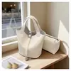 Bolsa Feminina de Design de Nicho com Padrão Lichia, Bolsa de Mão Lisa, Novo Modelo 2026, Bolsa Saco Feminina Casual Simples