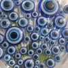 Venta al por mayor de fábrica resina ojos azules disco pavo ojo del diablo ojo plano azul parche DIY