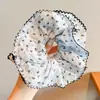 Goma para el pelo con estampado de leopardo marrón para otoño e invierno para mujer, scrunchie elegante y sofisticado para peinados de moño