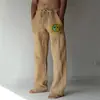 Comercio electrónico transfronterizo para hombre tendencia callejera de estampados talla grande pantalones casuales pierna ancha pantalones deportivos en stock (una lata