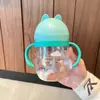 Taza de Agua Taza de Aprendizaje para Beber con Popote para Niños Taza Graduada para Bebé de un Año Botella de Agua Portátil Botella de Leche con Bola de Gravedad Linda