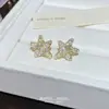 Pendientes de Moda Dulces y Frescos para Mujer, Lujo Ligero con un Toque de Alta Gama, Pendientes Versátiles con un Diseño Único, Pendientes de Botón de Nicho al por Mayor