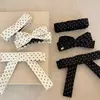 Presilha de Cabelo Estilo Coreano de Tecido com Bolinhas e Laço Clip Banana de Alta Qualidade Exquisite Clip para Nuca Clip Torcido Acessórios de Cabelo para Mulheres