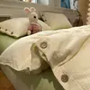Nuevo modelo 2026 juego de cama de cuatro piezas, sábana bajera, funda de edredón, ropa de cama para todas las estaciones, funda de edredón, juego de tres piezas para cama individual
