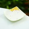 Posavasos de cerámica hechos en fábrica con patrones florales dorados, portavasos de té, accesorios para juegos de té, tapetes resistentes al calor y platos para bocadillos estilo chino para uso doméstico