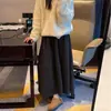Falda de Lana Gris Oscuro para Mujer Otoño e Invierno 2025 Estilo Nuevo Cintura Alta Pequeña Aspecto Adelgazante Línea A Longitud Media Falda de Botón