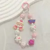 Cadena creativa TOY de dibujos animados para teléfono móvil de palomitas de maíz, cadena colgante de cuentas, cadena de mano, cuentas pintadas a mano, accesorios para equipaje, joyería creativa