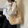 La nueva y exquisita y elegante bolsa de axila de gran capacidad para el día a día de Henggeng es un bolso de hombro casual y lindo, bolso de mano simple y versátil