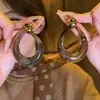 Modernos y Minimalistas Brazaletes para Oreja Retorcidos de Piedra Ojo de Tigre para Mujer, Pendientes Versátiles Vintage, Accesorios para Orejas de Otoño e Invierno con un Toque de Lujo Ligero y de Alta Gama