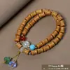Pulseira de contas de oração budista de madeira crua natural, vendida a quente, sândalo dourado, sândalo Barbie, pulseira colecionável para homens e mulheres, fornecimento para live-stream
