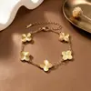 Exclusivo para comercio electrónico transfronterizo europeo y americano: Pulsera de cadena hueca grabada con trébol de cuatro hojas y conjunto de brazalete incrustado con diamantes para mujer, joyería de acero inoxidable