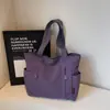 Bolsa Feminina de Grande Capacidade Cor Lisa 2025 Inverno Nova Estilo Coreano Simples Bolsa Tote para Exterior Bolsa de Ombro de Alto Valor para o Dia a Dia