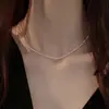 Collar de perlas de doble capa estilo retro francés para mujer, ligero, lujoso, de alta gama, con cadena para el cuello.