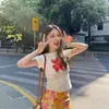 Camiseta Blanca de Manga Corta con Estampado Floral Estilo Americano, Dulce y Picante, para Mujer, Nueva de Verano 2026, Ajustada, Hombro Normal, Top Corto