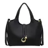 Bolso de mano de alta calidad para mujer 2026 nueva moda versátil para el día a día bolso cruzado color sólido bolso de mano de cuero suave bolso tipo cubo
