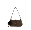 Bolso de axila retro de gamuza nuevo 2026 para mujer, bolso de hombro cruzado de alta gama con colgante de bola de pelo, bolso tote para el día a día