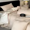 Juego de cuatro piezas de jacquard de algodón de fibra larga de Xinjiang, lujoso y de alta gama, tejido grueso, de algodón puro para ropa de cama, incluye funda de edredón y sábana bajera