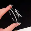 Pulsera de lazo de circonita microincrustada de alta gama, dulce y fresca, versátil, para mujer, accesorio de muñeca de moda de lujo ligero, venta al por mayor