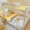 Nuevo modelo 2026 cama de estudiante, conjunto de cuatro piezas de gasa arrugada fresco y simple para cama individual en dormitorio