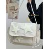 Nova bolsa carteiro vermelha da moda 2023, feminina, design de nicho japonês, bolsa de ombro de lazer com estrela de cinco pontas, bolsa carteiro